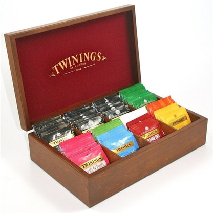 1 boîte de 8 compartiments + 2 tasses + un support en céramique + 160 sachets assortis