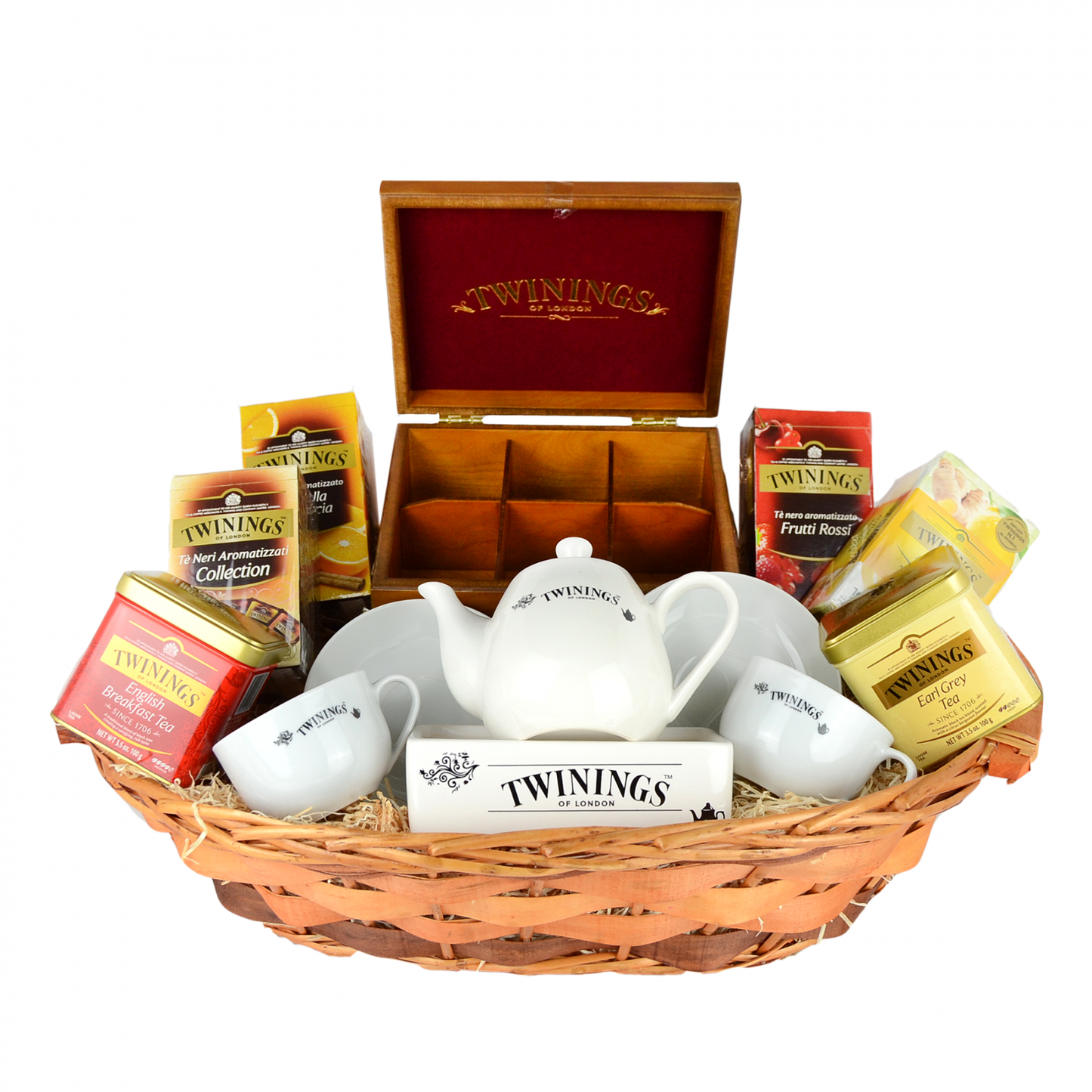 cesto natalizio con mix di tè, tisane e camomille, teiera e tazzine, scatola in legno e caddy porta bustine tè sfuso