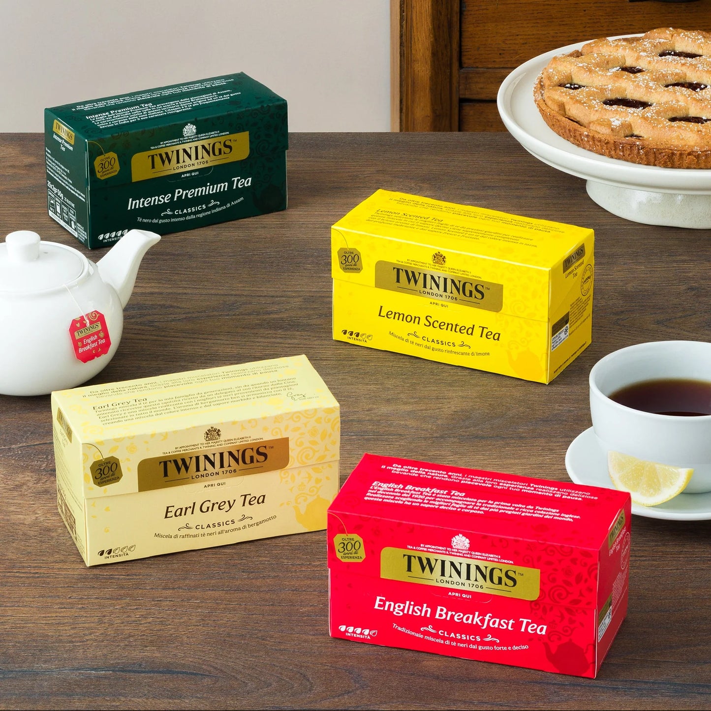 1 boîte de 8 compartiments + 2 tasses + un support en céramique + 160 sachets assortis