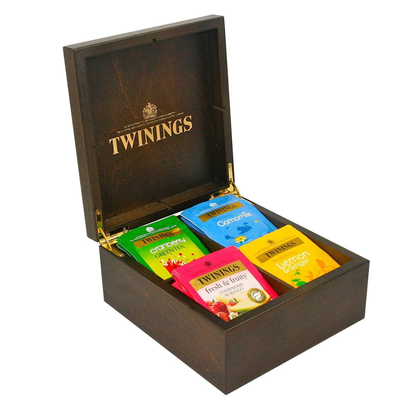 1 Caja de 8 compartimentos + 2 tazas + caddy de cerámica + 160 sobres surtidos