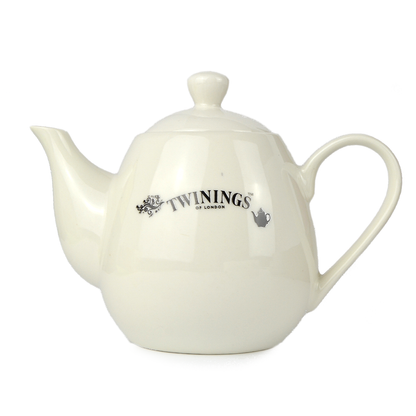 cesto natalizio con mix di tè, tisane e camomille, teiera e tazzine, scatola in legno e caddy porta bustine tè sfuso